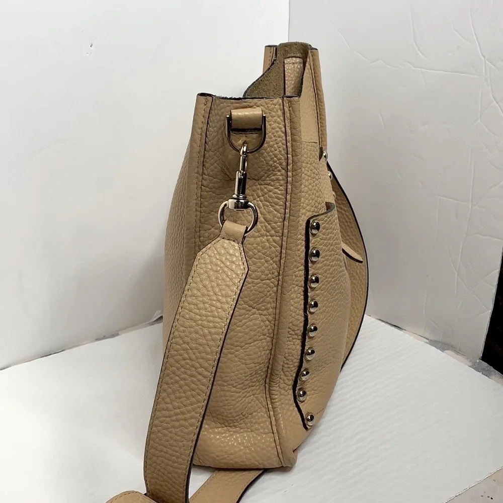 Rebecca Minkoff pebbled leather feed bag.